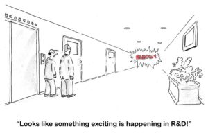 B&W business cartoon showing an explosion at the end of the hall. Two businessmen remark, 'looks like something exciting is happening in R&D'.