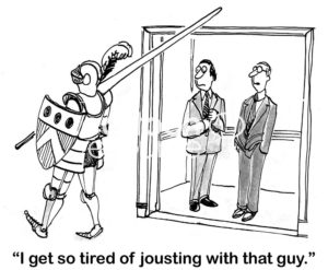Businessman cartoon showing a business man walking by in knight's armor, the coworker says, 'I get so tired of jousting with that guy'.