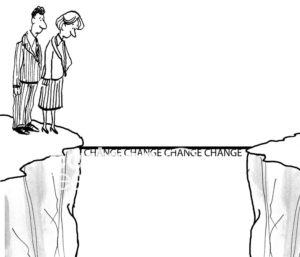 B&W change cartoon showing two business people timidly looking down at the frightening bridge they need to cross that announces 'change'.