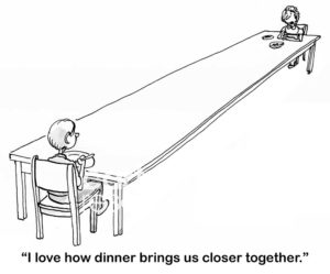 Family b&w cartoon of a mother and son at a very, very, very long table. Mom says, "I love how dinner brings us closer together'.
