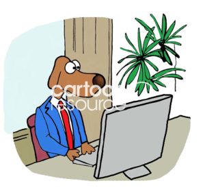 Color cartoon showing a brown business dog wearing his blue suit and working at his desk computer.