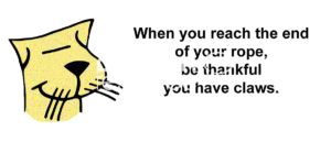 Cat cartoon of a smiling yellow cat, head and neck, and the words, 'When you reach the end of your rope, be thankful you have claws'.