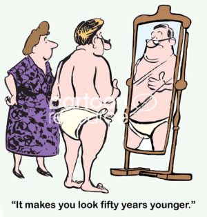 Marriage color cartoon of a wife and husband. The husband is wearing a diaper and looking in a mirror. The wife says, "It makes you look fifty years younger".