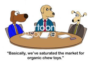 Color marketing cartoon of three business dogs in a meeting. One says, 'basically, we've saturated the market for organic chew toys'.