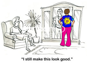 Marriage color cartoon of a couple. The husband has tried on his tie-dye clothes from the 1960's and says "I still make these look good".