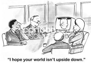 Office b&w cartoon of four people in a video meeting. The person on the video is upside down and a meeting participant says to him, "I hope your world isn't upside down".