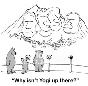 Bear family B&W cartoon of a young bear asking its Dad, 'why isn't Yogi up there?', as they look at Mount Rushmore.