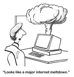 Work B&W cartoon of a male office worker at his desk and his computer has smoke coming out of it. "Looks like a major internet meltdown."