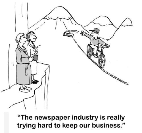 Office cartoon of a married couple on a cliff ledge and a newspaper bicyclist riding a tightrope near them. "The newspaper industry is really trying hard to keep our business."