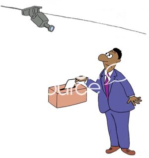 Color illustration of a black male professional being watched by a video camera as he puts a suggestion in the suggestion box,