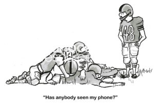 BW cartoon of a football field. Players are on the ground after a tackle. One is standing and asking if they have seen his cell phone.