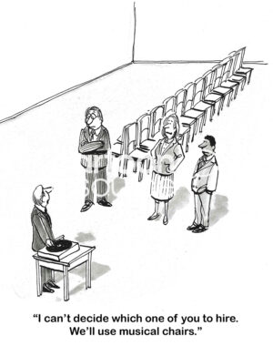 BW cartoon of a boss, three job applicants and lots of chairs. The boss can't decide which to hire so he decides to use 'musical chairs' to make the decision.